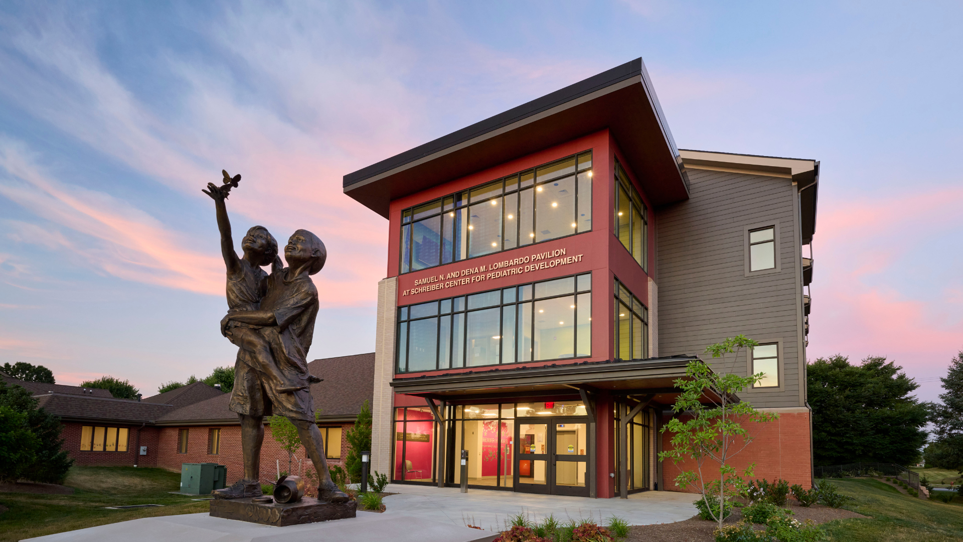 Statue and front of Schreiber Pediatrics building.