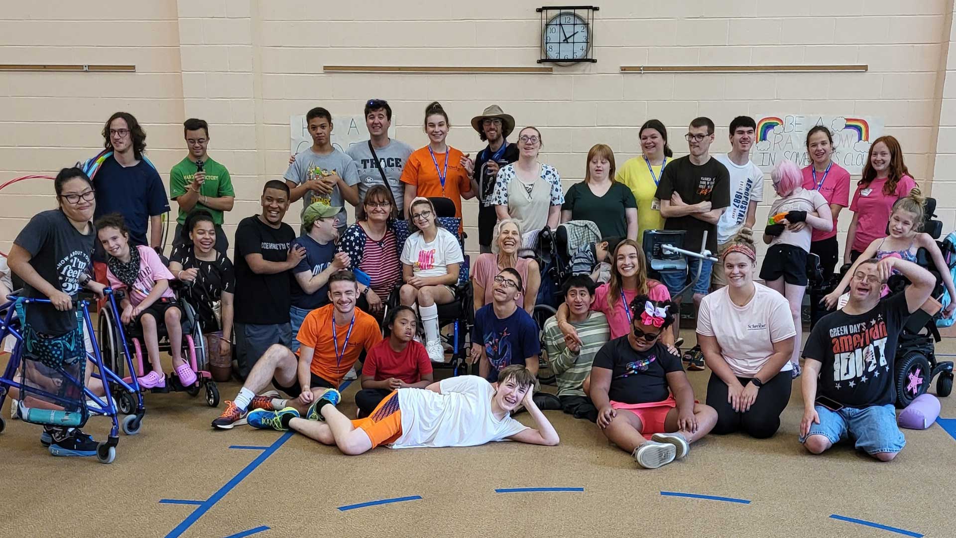 group of students posing for picture in gym